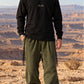 Divine Order (long sleeve) של 613, חולצת ציצית שחורה עם שרוול ארוך, צילום חוץ בנוף מדברי