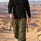 Divine Order (long sleeve) של 613, חולצת ציצית שחורה עם שרוול ארוך, צילום חוץ בנוף מדברי