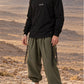 Divine Order (long sleeve) של 613, חולצת ציצית שחורה עם שרוול ארוך, צילום חוץ בנוף מדברי