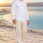 Divine Order (long sleeve) של 613, חולצת ציצית לבנה עם שרוול ארוך, צילום חוץ מול נוף פתוח