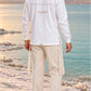 Divine Order (long sleeve) של 613, חולצת ציצית לבנה עם שרוול ארוך, צילום חוץ מול נוף פתוח